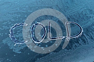 Cold written on frozen car window