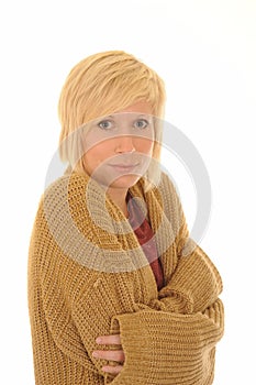 Cold young woman in cardigan photo