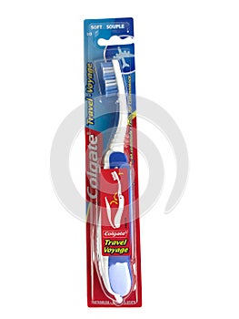 Colgate Travel Toothbrush on White Backdrop