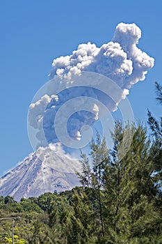 Colima volcano with steam eruption photo