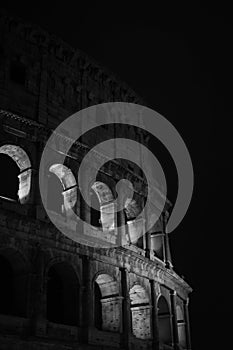 The coliseo of Rome at night in black and white photo