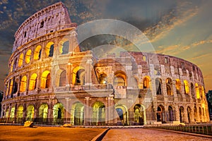 Coliseum enlighted at sunrise, Rome, Italy, no people photo