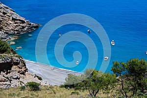 Coll Baix beach in Alcudia bay in Mallorca Balearic islands of Spain. Tropical paradise beach.Summer vacation travel holiday backg