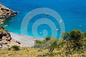 Coll Baix beach in Alcudia bay in Mallorca Balearic islands of Spain. Tropical paradise beach.Summer vacation travel holiday backg