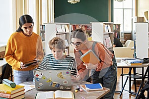 Collaborating on Group Project in Library Setting