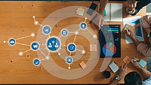 Collaboration and Data Analysis in a Modern Workspace with Charts, Graphs, and Team Interaction Highlighting Digital