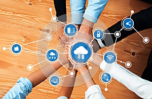 Collaborative Hands Over Digital Cloud Network with Icons Representing Data Storage, Security, Communication, and