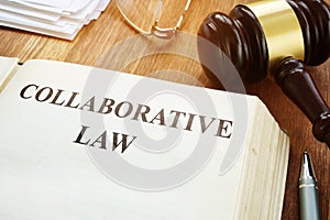 Collaborative law book, gavel and papers