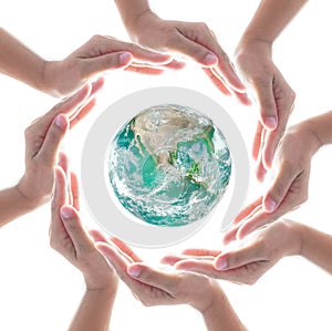 Collaborative people`s hands surrounding globe world map for community empowerment concept