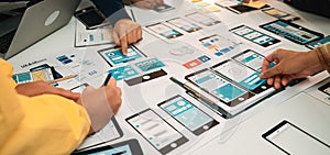 Collaborative Team Brainstorming Session on User Interface Design with Mobile Mockups and Prototypes on a Conference