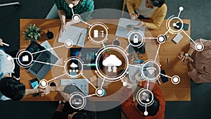 Collaborative Workspace with Diverse Professionals Engaged in Cloud Computing and Data Analysis in a Modern Office