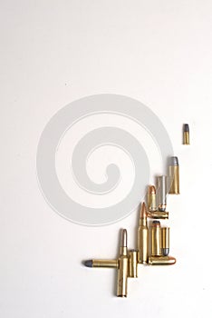 Collage of bullets of different calibers on a white background.