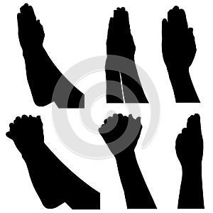 Collage of different praying hands silhouettes