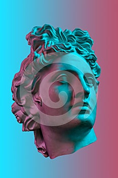 Collage with plaster antique sculpture of human face in a pop art style. Creative concept colorful neon image with photo