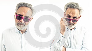 Collage portrait of middle-aged man wearing fuscia sunglasses showing suspicion isolated white background studio shot