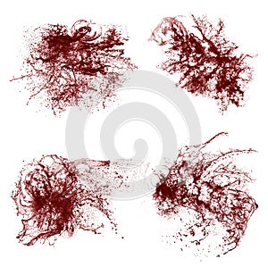 Collage of red liquid splashes. Liquid with splashes on a white background.