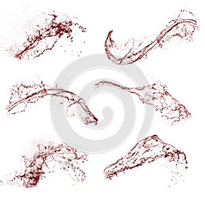 Collage of red liquid splashes. Liquid with splashes on a white background.