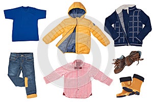 Collage set of little boys autumn clothes isolated on a white background. Denim trousers or pants, sneaker, a down jacket, shirts