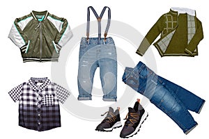 Collage set of little boys spring clothes isolated on a white background. Denim trousers or pants, a pair of shoes, a rain jacket