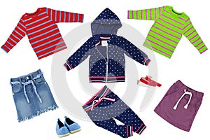 Collage set of little girl clothes isolated on a white background. The collection of a blue jacket with pants, jeans skirt and a