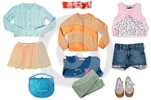 Collage set of little girl summer clothes isolated on a white background. The collection of blue denim shorts, a rain jacket, a