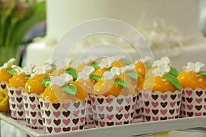 Collage of various cupcakes in decorative cup