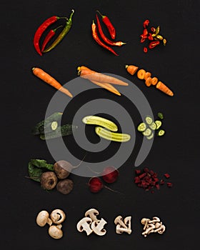 Collage of various vegetables on black background, isolated