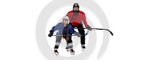 Collage of woman and girl, professional hockey players in uniform with helmet and stick training isolated over white