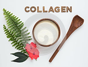 Collagen Peptides in Bowl with Fern and Flowers