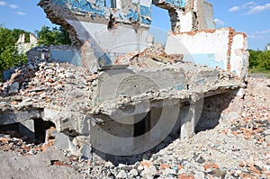 Collapsed industrial multistorey building in daytime