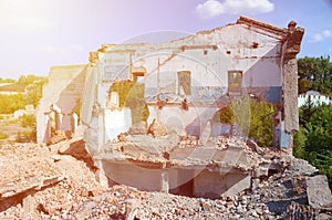 Collapsed industrial multistorey building in daytime