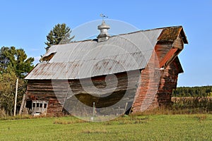 Collapsed old red barn