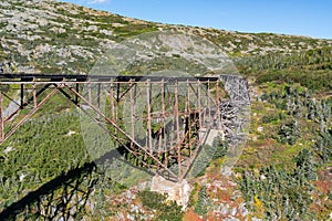 Collapsed railroad bridge along White Pass in Alaska