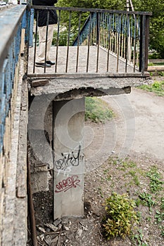 The collapsing bridge. Damaged bridge support close - up transportatin concrete