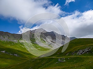 Colle Del Puriac - Scenic alpine hiking trail with panoramic view of mountains and hills in valley Valle Stura