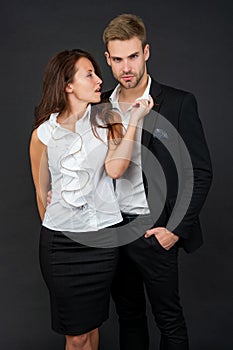 colleague experts. man and brunette woman leadership. business partners on black background