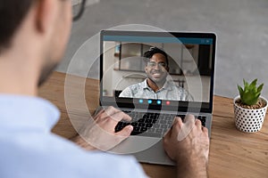 Colleague talk on webcam zoom meeting on laptop