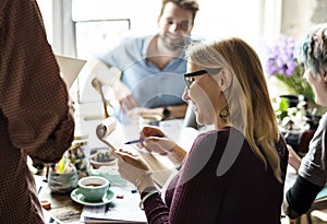 Colleagues Exchanging Opinion Ideas Working