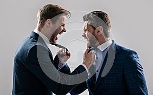 colleagues have disagreement and conflict. businessmen face to face. disrespect and contradiction.