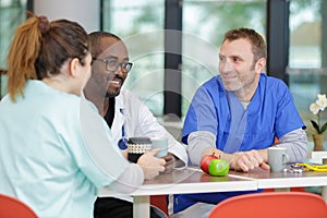 Colleagues in hospital cafeteria