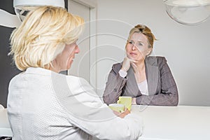 Colleagues talking in the coffeebreak