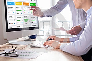 Colleagues working on agile product development board with scrum or kanban framework, lean methodology, iterative or incremental photo