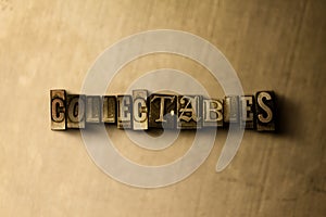 COLLECTABLES - close-up of grungy vintage typeset word on metal backdrop