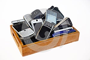 Collected Cell Phones in a tray