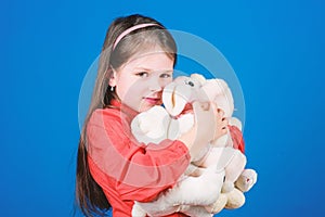 Collecting toys hobby. Cherishing memories of childhood. Small girl smiling face with toys. Happy childhood. Little girl photo