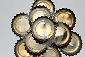 A collection of aluminum lids on soft drinks