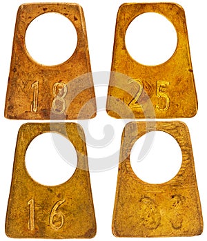 Collection of ancient brass cloakroom labels