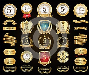 Collection of Anniversary gold laurel wreath badges and labels vector illustration