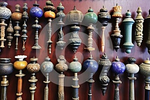 collection of antique door knobs on display