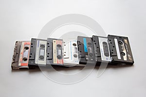 Collection of audio cassettes on white background